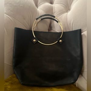 Tribe Alive leather wrist bag